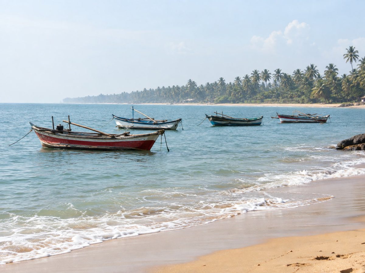 Fishing boats off the Kalutara–Waskaduwa coast, pale sky